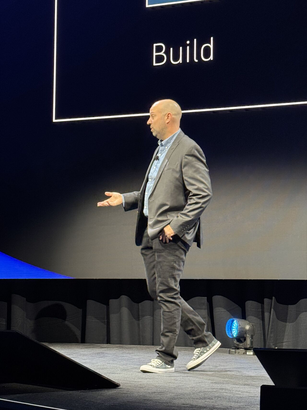 David Walker on stage at a tech conference